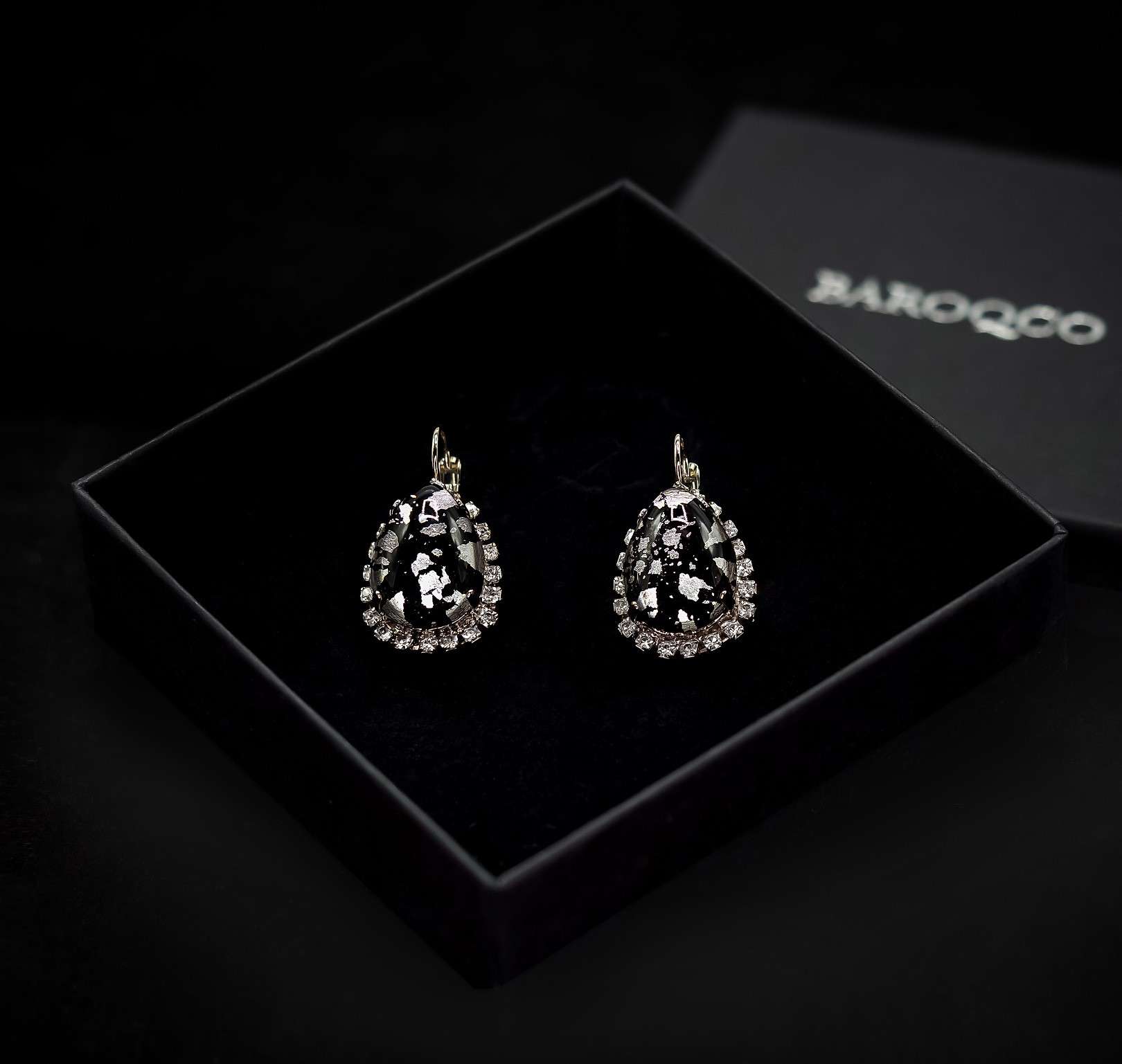 BAROQCO luxurious gift box featuring 'The Cruella' Bohemian stone statement earrings. These exquisite earrings showcase Swarovski crystals, genuine CRYSTAL®, semi-precious stones, and freshwater pearls, set in recycled silver or gold plating—nickel-free. A timeless expression of luxury, haute couture, and regal elegance.
